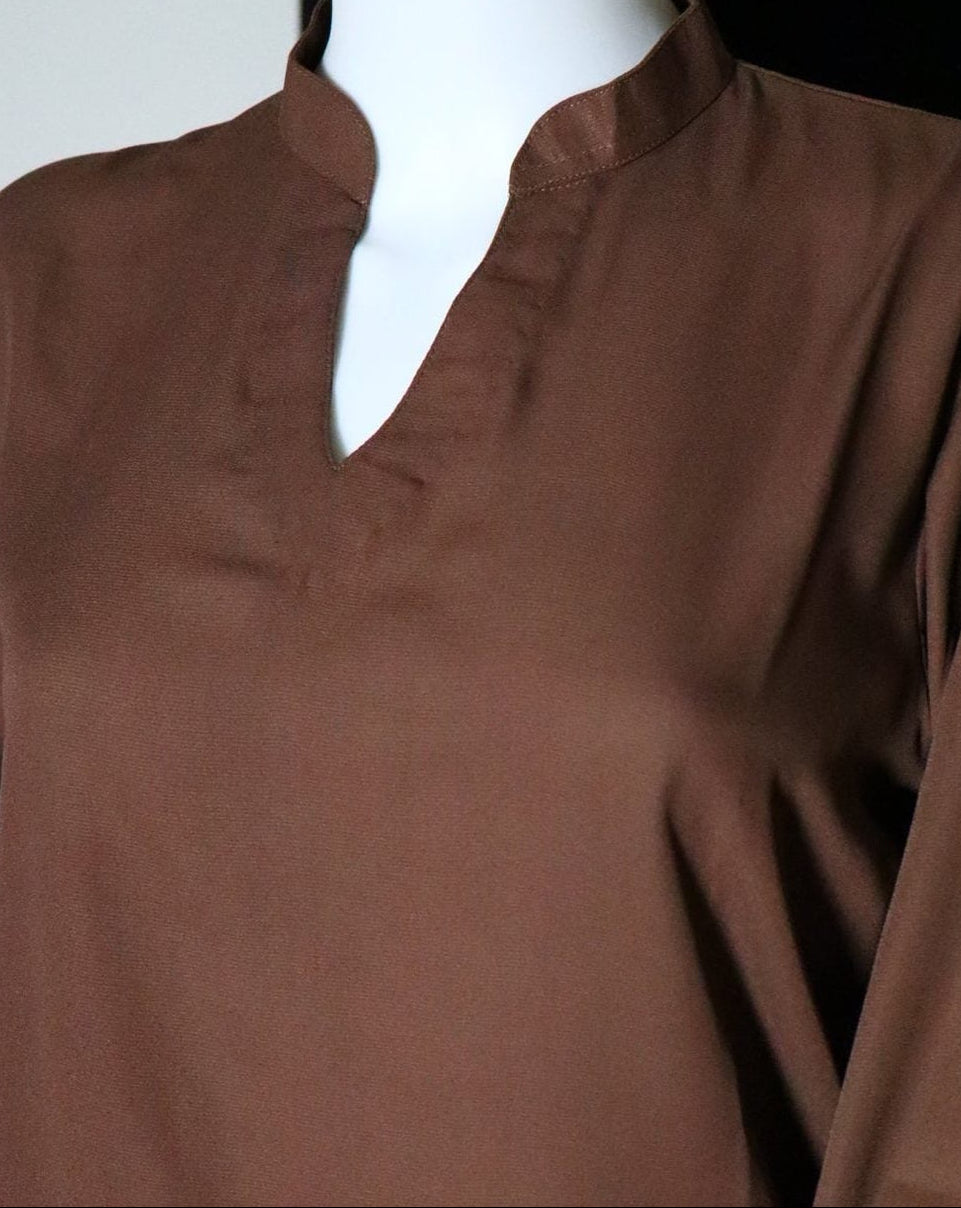 Close up of the fabric in brown.