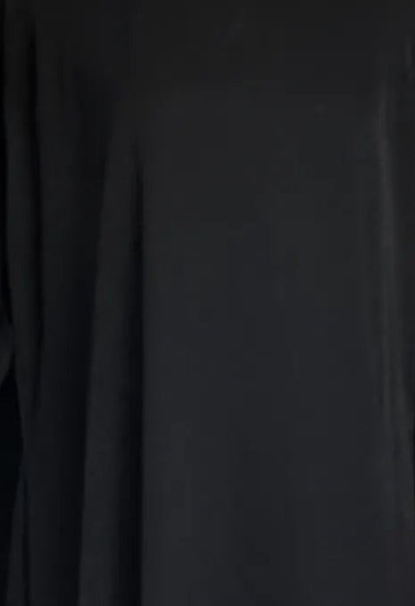 A close up of woman wearing black colour dress.