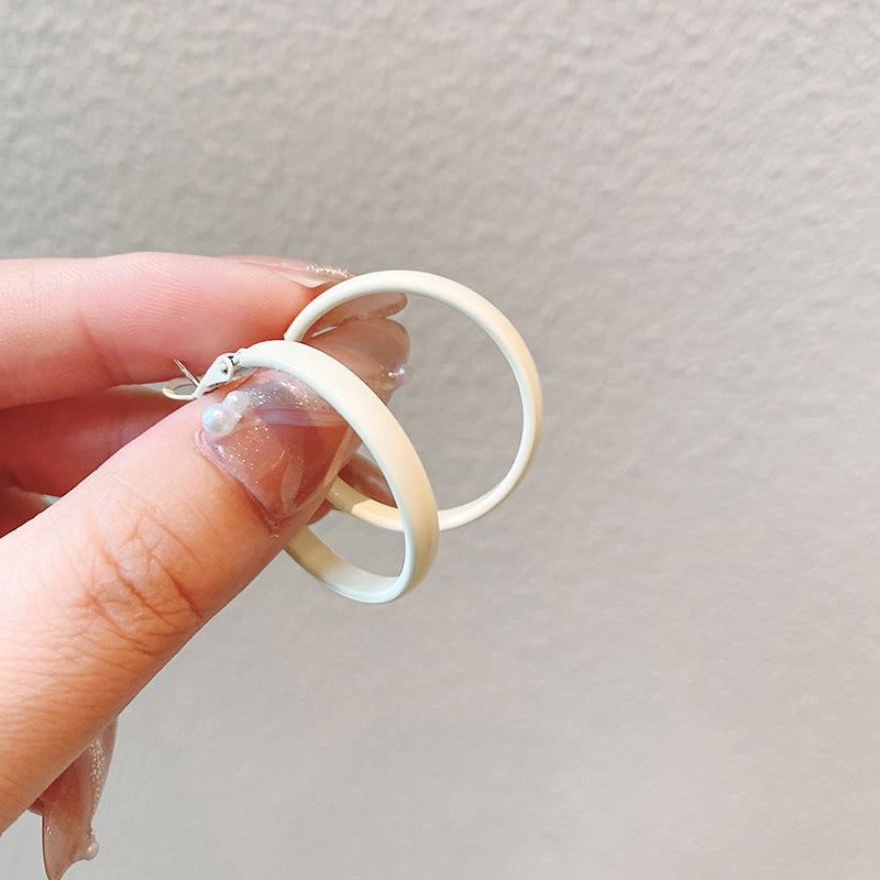 Sleek White Hoop Earrings