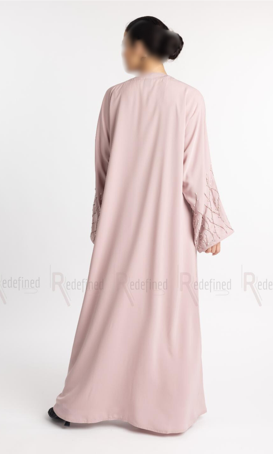 Tharaa Abaya