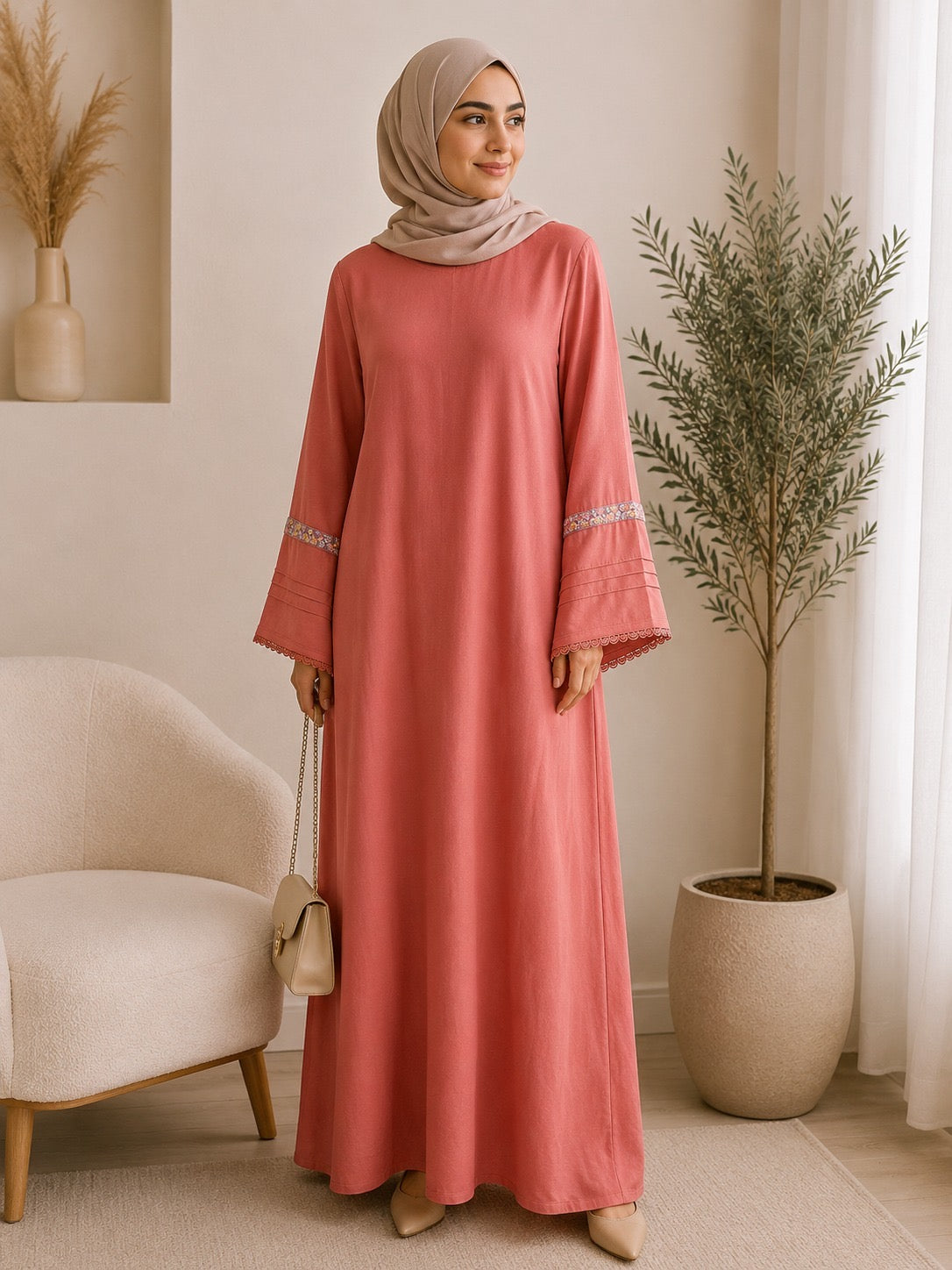 Elegant dusty rose pashmina abaya dress featuring embroidered wide sleeves, a flowing maxi silhouette, and a modest relaxed fit.