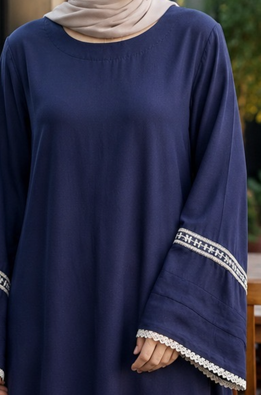 Elegant navy blue pashmina abaya dress featuring embroidered wide sleeves with lace trim, a flowing full-length silhouette, and a relaxed modest fit.