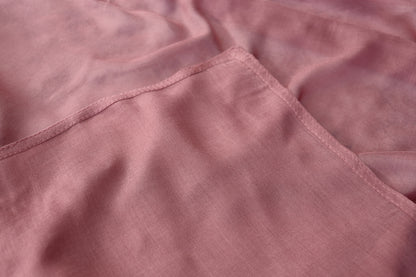 Pink fabric fold showing stitch