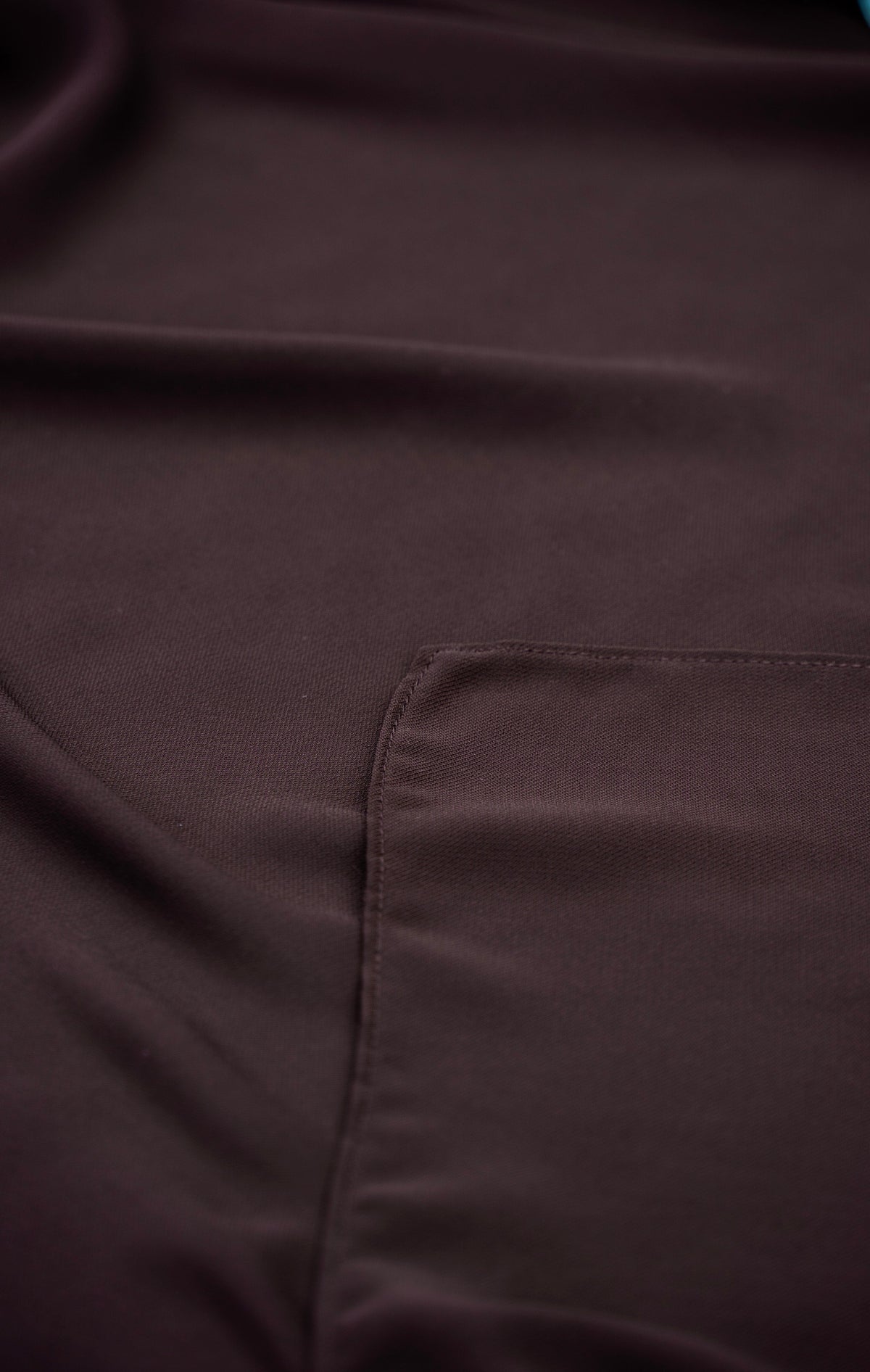 Close-up of a brown fabric with a fold