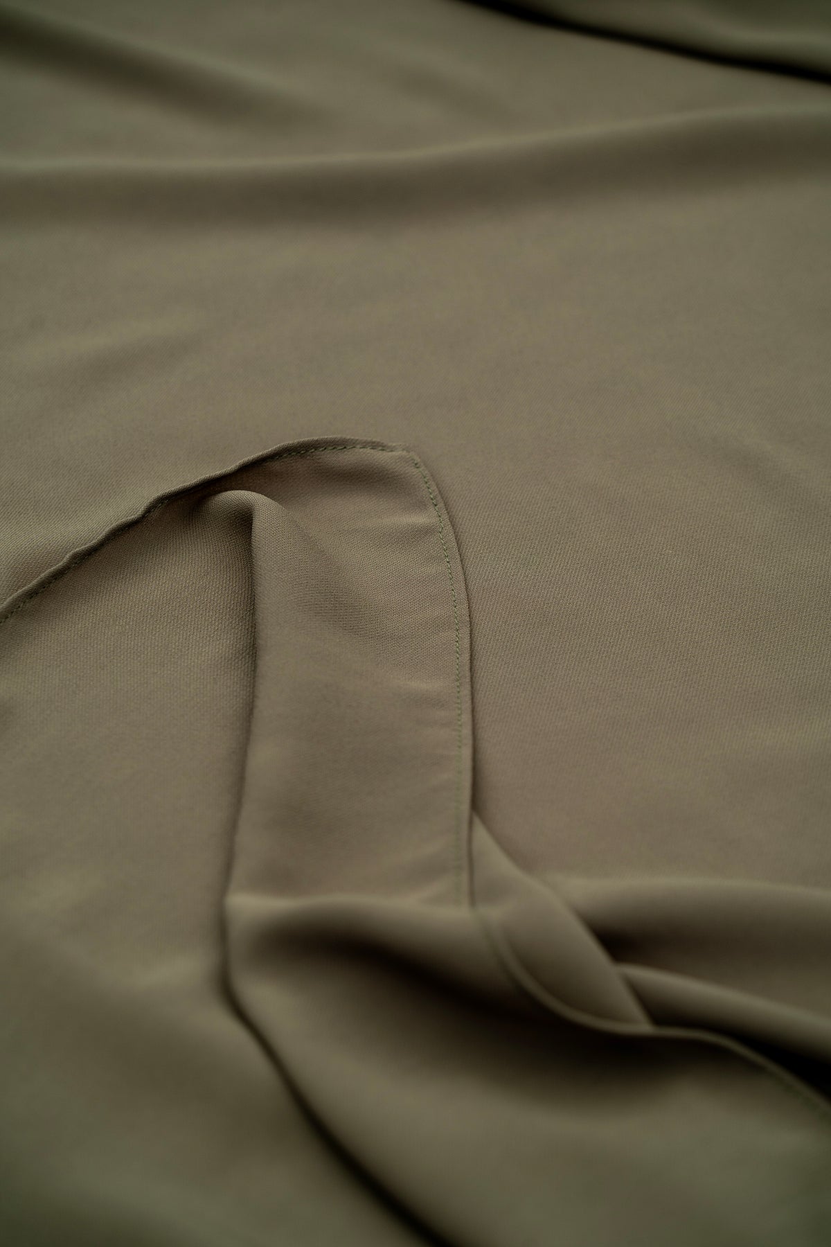 Close-up of beige fabric with a slight texture