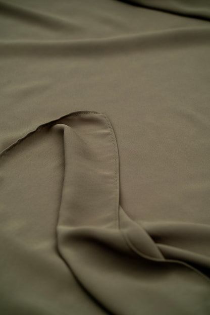 Close-up of beige fabric with a slight texture