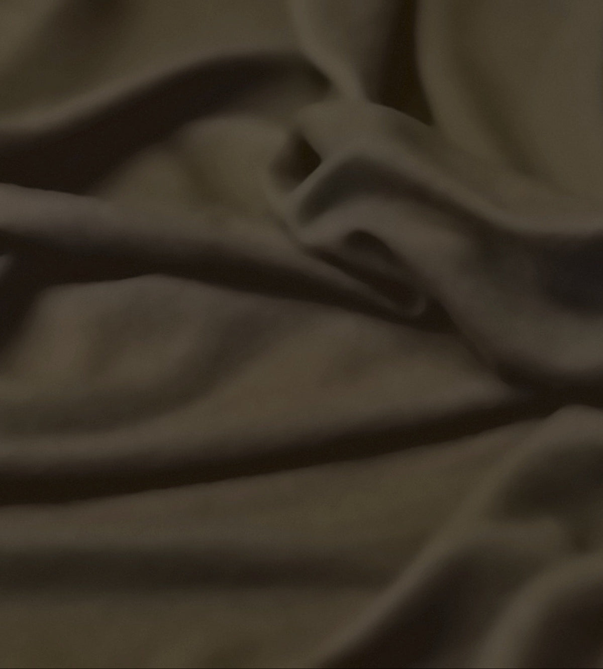 Close-up of a brown fabric with some folds