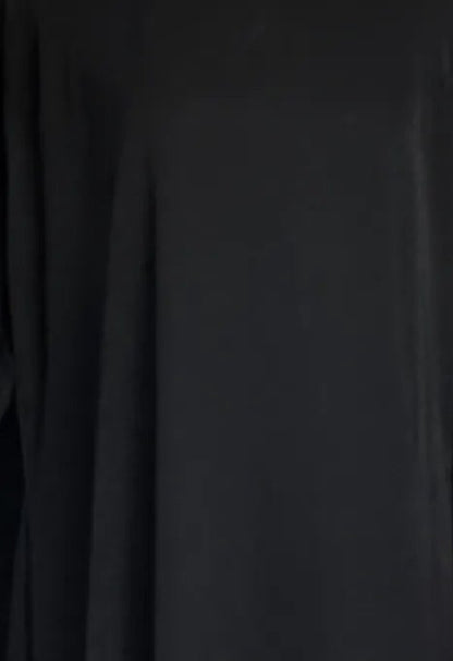 A close up of woman wearing black colour dress.